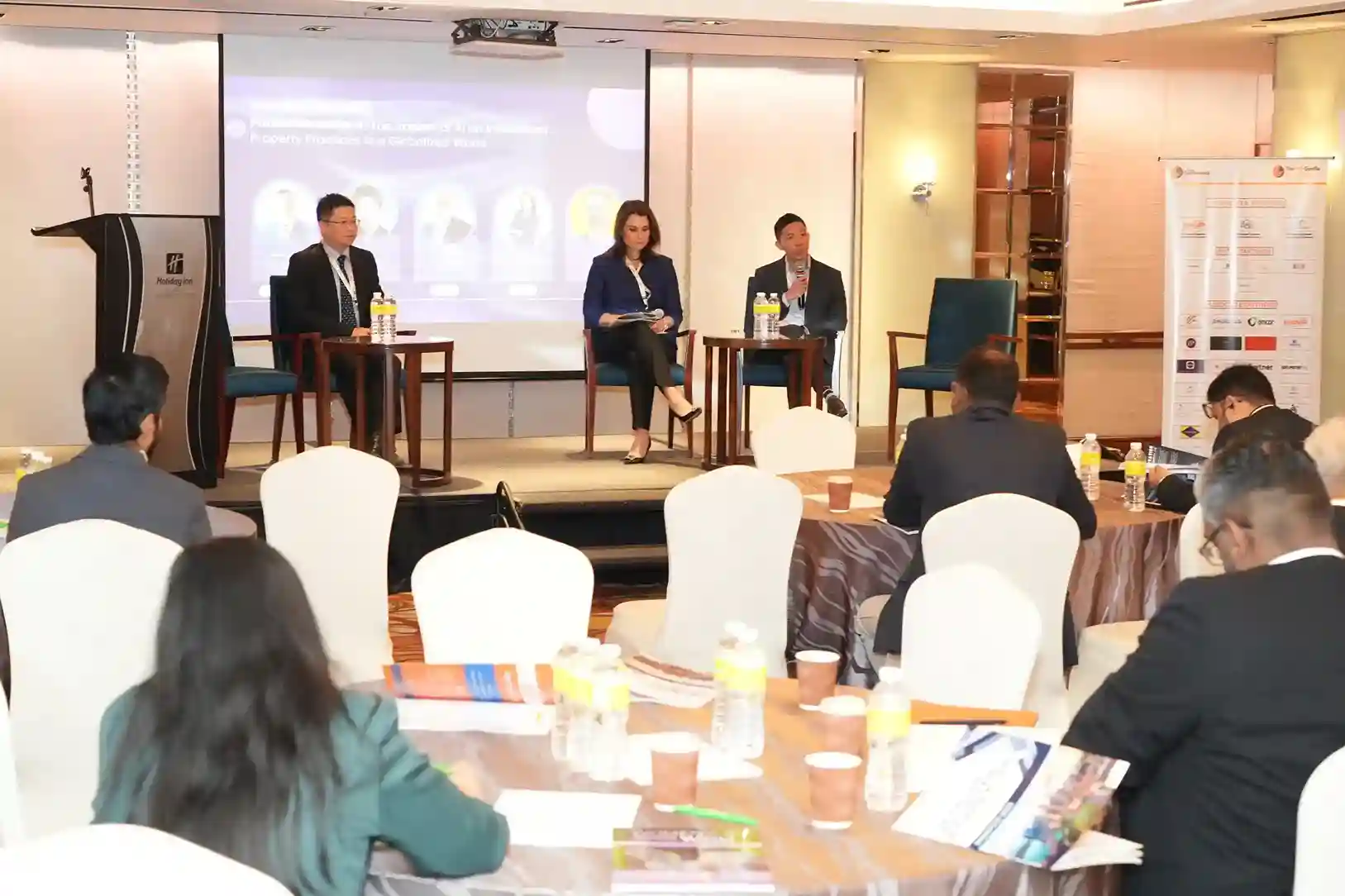 Real estate professionals looking at blueprints